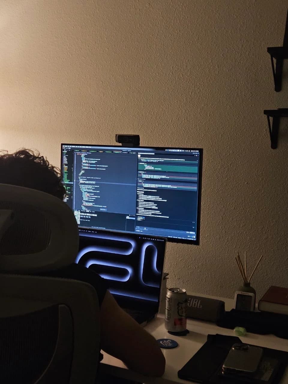 An evening coding session at a desk