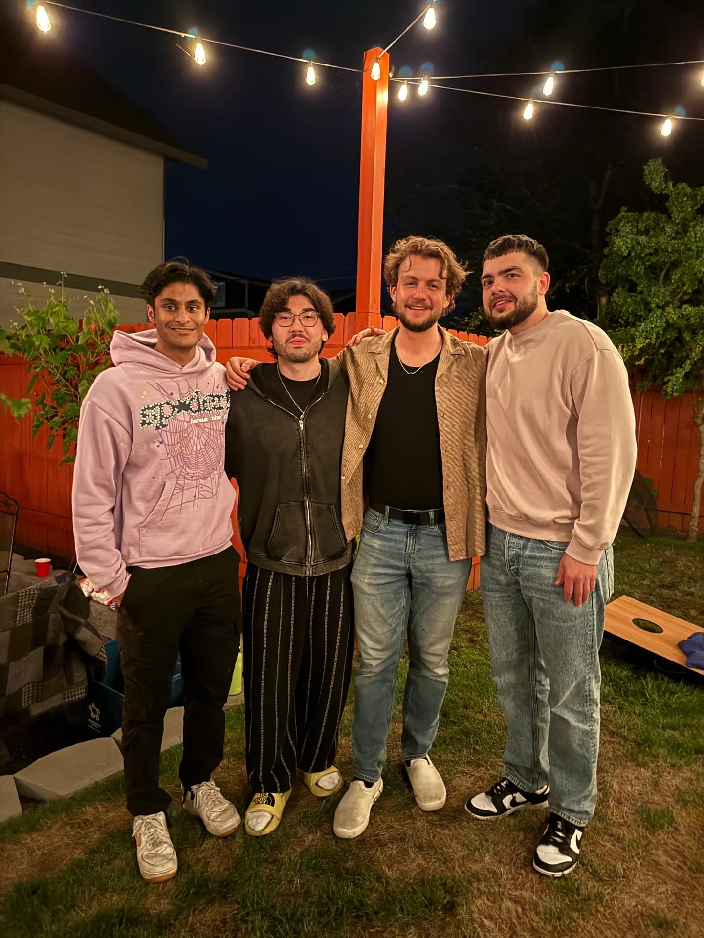 Friends at a backyard birthday party