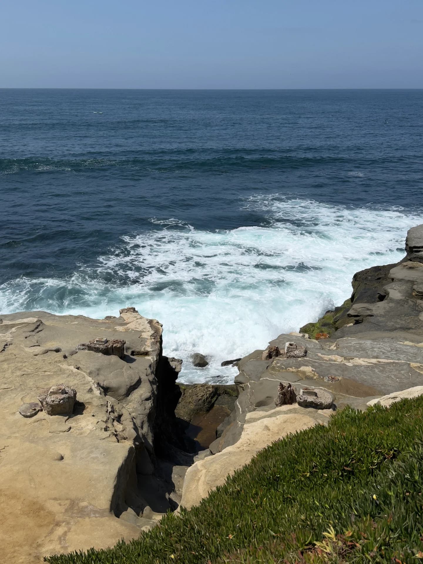 Waves breaking against the rocky shore