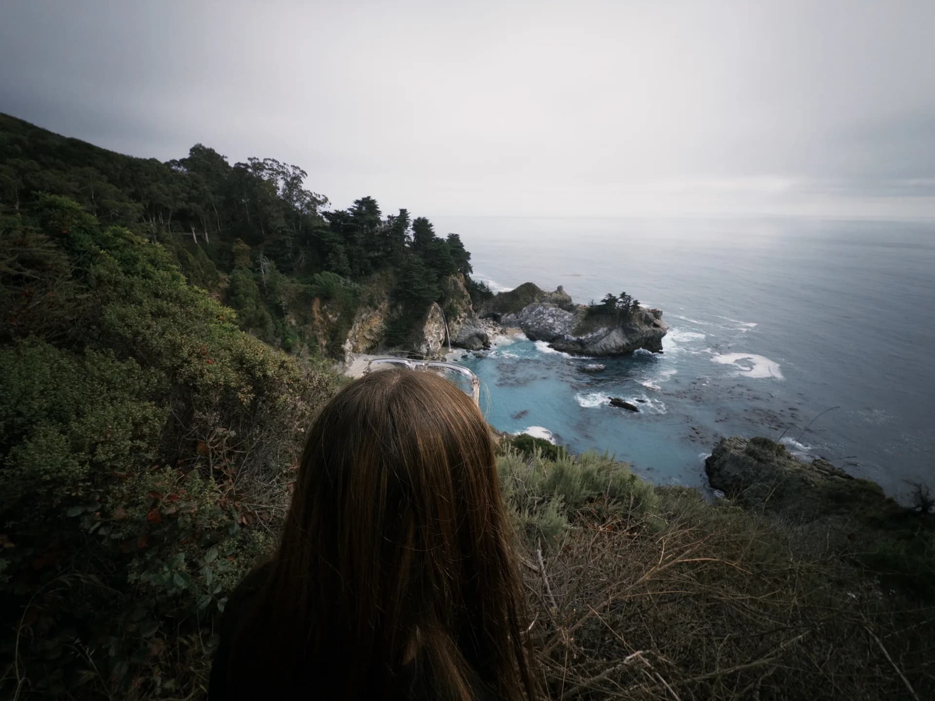 My girlfriend taking in the waterfall and cove